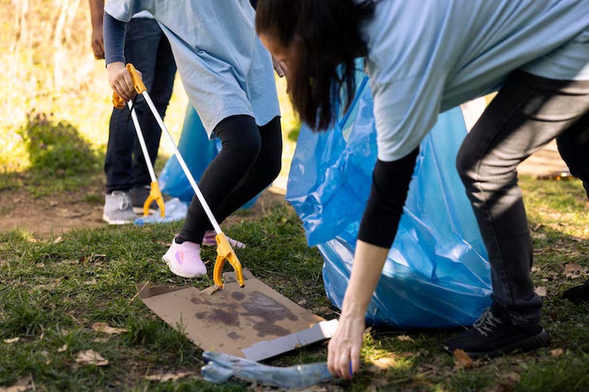 Young volunteers on a community clean-up drive